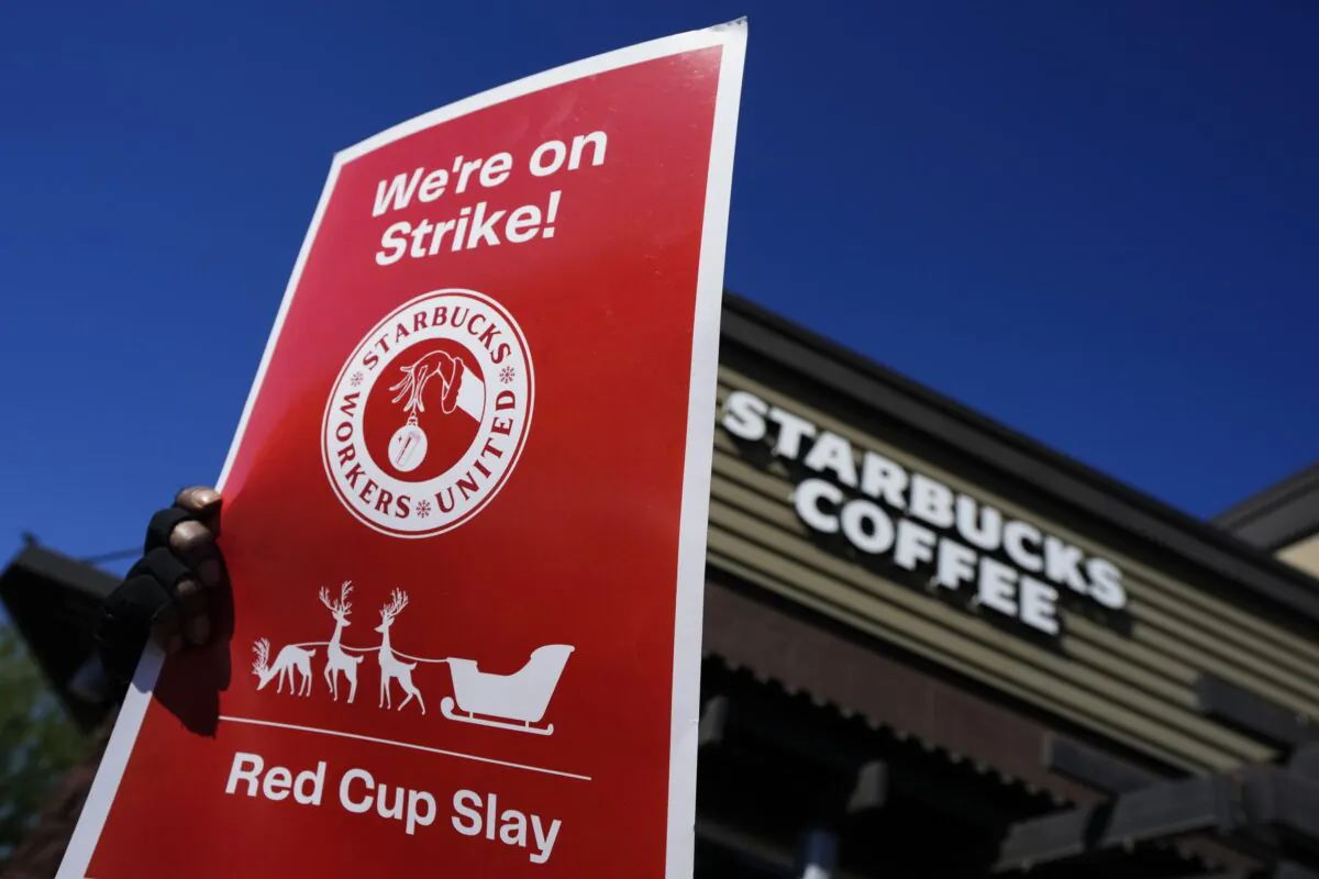 Starbucks employees strike outside their store in Mesa, Ariz., on Nov. 17, 2022. (Matt York/AP Photo)