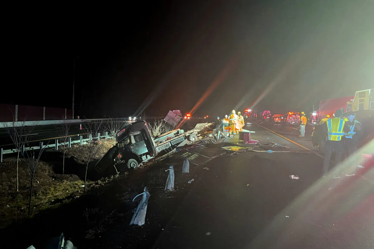 Emergency personnel at the scene of a crash on Interstate 64 in York County, Va., on Dec. 16, 2022. (Virginia State Police via AP)