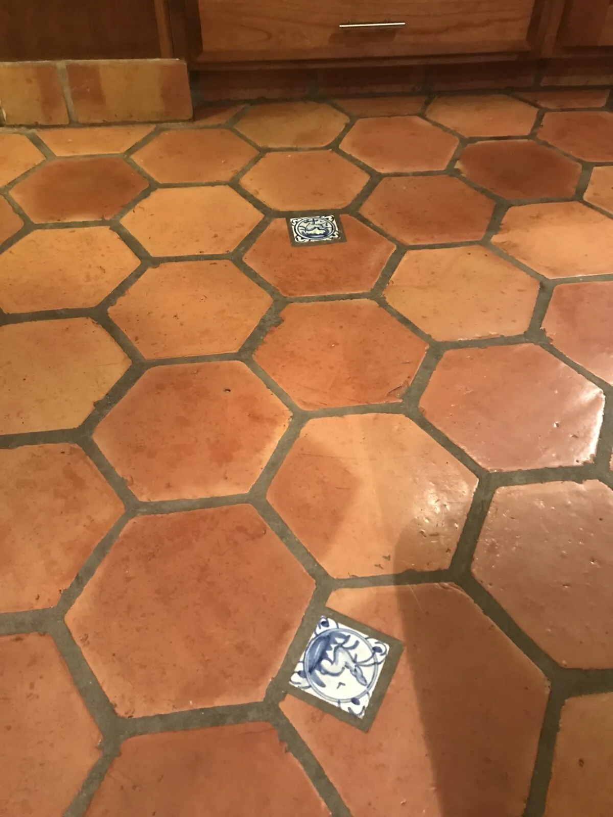 This tile floor may look good to you, but believe me it's got layers of wax that was applied over dirt. (Tim Carter/Tribune Content Agency)