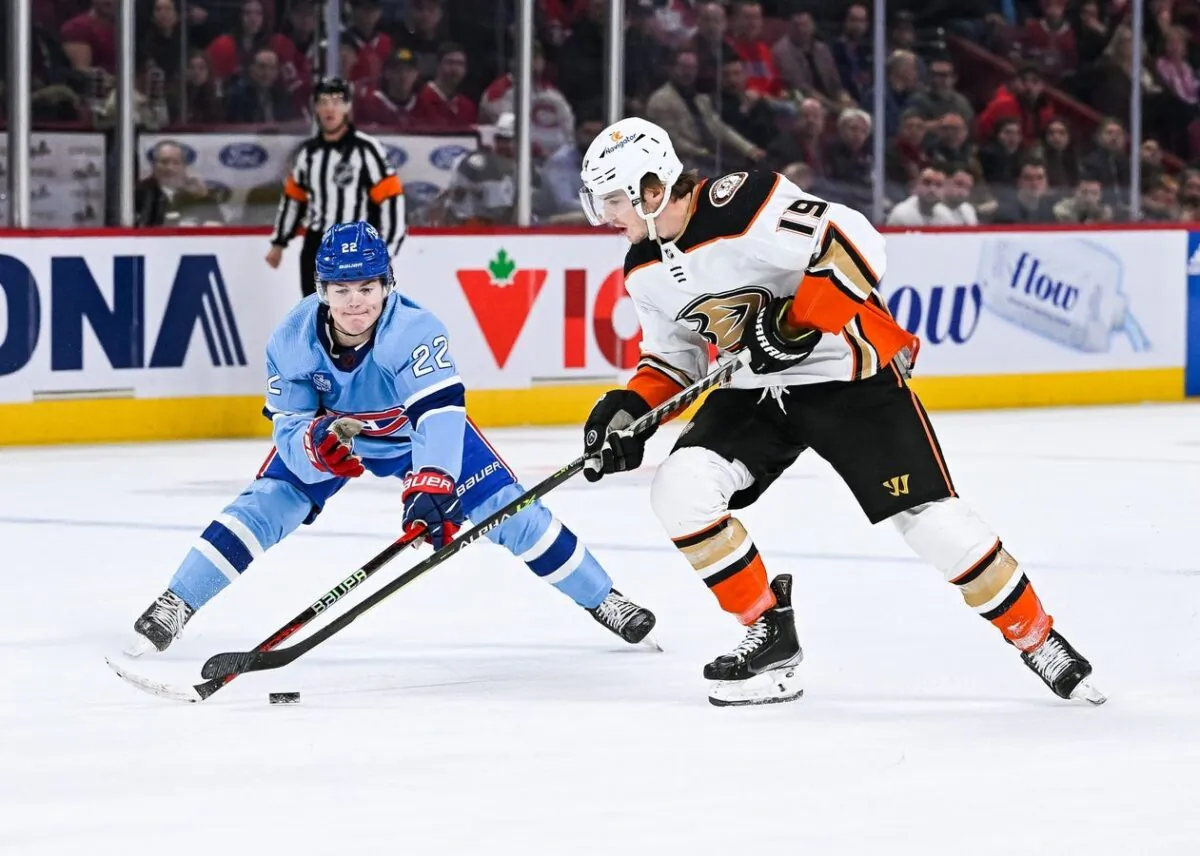 Anaheim Ducks right wing Troy Terry (19) plays the puck as Montreal Canadiens right wing Cole Caufield (22) defends during the first period at Bell Centre in Montreal, Quebec, Canada, on Dec. 15, 2022. (David Kirouac/USA TODAY Sports via Field Level Media)