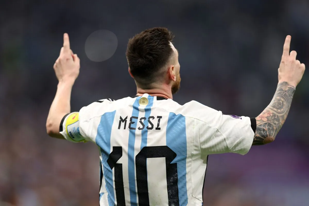 Lionel Messi of Argentina celebrates scoring the first goal from the penalty spot during the FIFA World Cup Qatar 2022 semi final match between Argentina and Croatia at Lusail Stadium in Lusail City, Qatar, on Dec. 13, 2022. (Richard Heathcote/Getty Images)