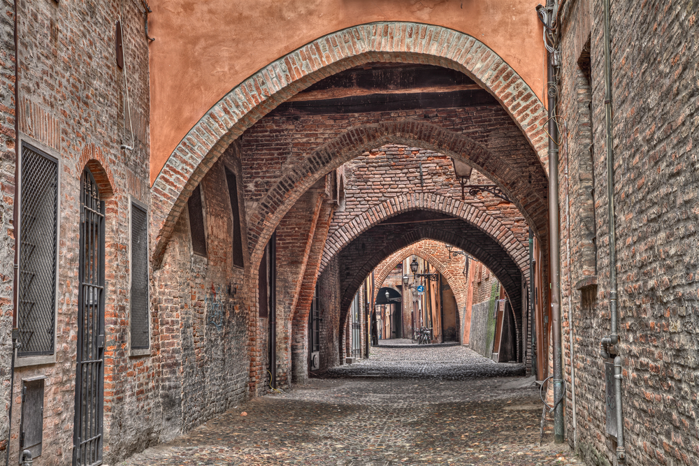 Ferrara,,Emilia,Romagna,,Italy:,The,Picturesque,Arched,Alley,Via,Delle