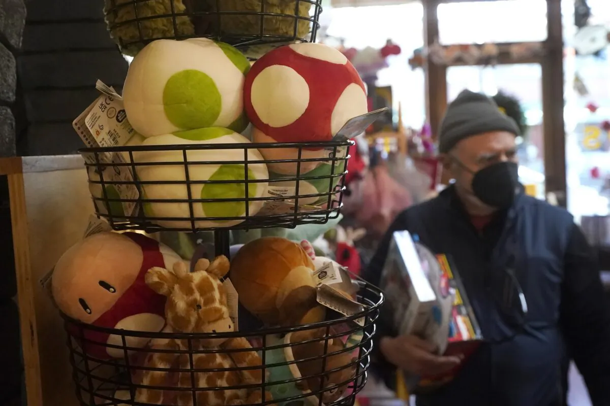 A basket of plush mushrooms and animals are shown as customers shop at a Five Little Monkeys store in Berkeley, Calif., on Dec. 12, 2022. (Jeff Chiu/AP Photo)