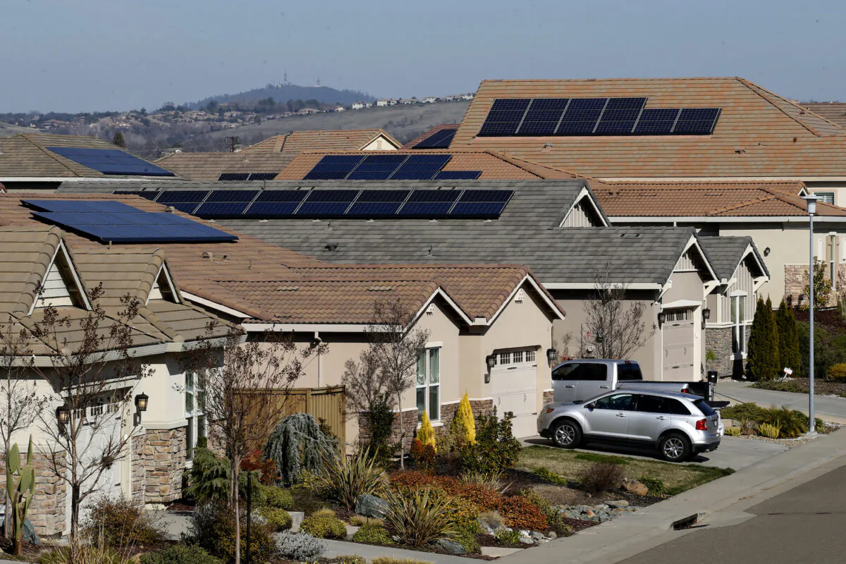 Solar panels sit on rooftops at a housing development in Folsom, Calif., on Feb. 12, 2020. (Rich Pedroncelli/AP Photo)