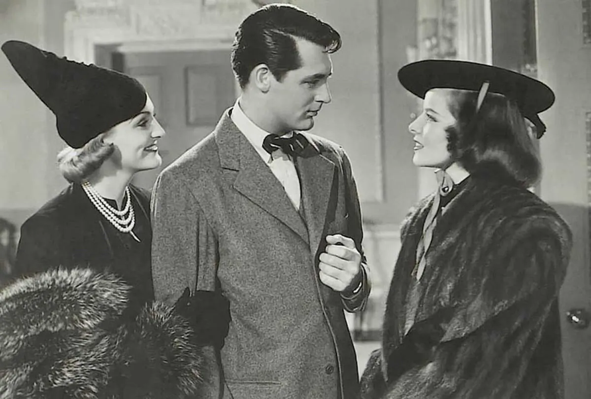(L– R) Julia Seton (Doris Nolan), Johnny Case (Cary Grant), and Linda Seton (Katharine Hepburn), in “Holiday.” (Columbia Pictures)
