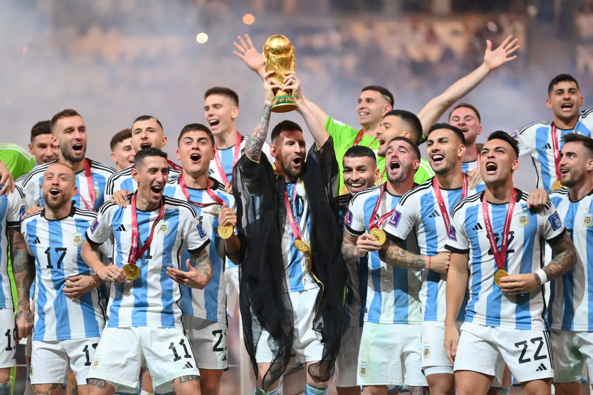 Lionel Messi of Argentina lifts the FIFA World Cup Qatar 2022 Winner's Trophy following the FIFA World Cup Qatar 2022 Final match between Argentina and France at Lusail Stadium in Lusail City, Qatar, on Dec. 18, 2022. (Dan Mullan/Getty Images)