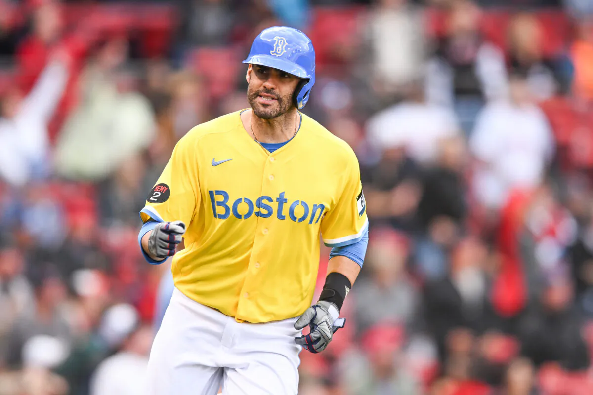 J.D. Martinez (28) of the Boston Red Sox reacts after hitting a two-run home run in the eighth inning against the Baltimore Orioles at Fenway Park, in Boston on Sept. 29, 2022. (Kathryn Riley/Getty Images)