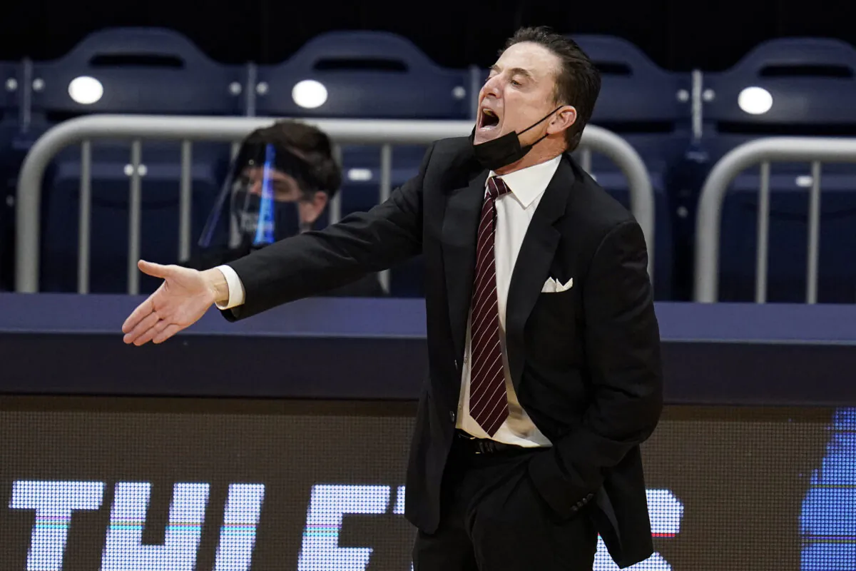 Iona head coach Rick Pitino gestures as his team plays against Alabama in the first half of a first-round game in the NCAA college basketball tournament in Indianapolis on March 20, 2021. (Michael Conroy/AP Photo)