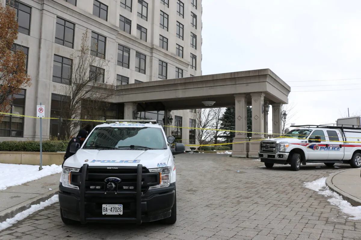 York Regional Police vehicles were seen parked at a condominium at 9235 Jane Street, in Vaughan on Dec. 19. A deadly shooting occurred at the condo on Dec. 18, leaving five people dead, including the suspect. (Andrew Chen/The Epoch Times)