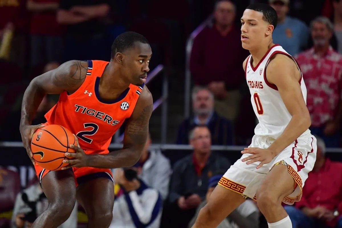 Auburn Tigers forward Jaylin Williams (2) controls the ball against Southern California Trojans forward Kobe Johnson (0) during the first half at Galen Center, in Los Angeles on Dec. 18, 2022. (Gary A. Vasquez/USA TODAY Sports via Field Level Media)