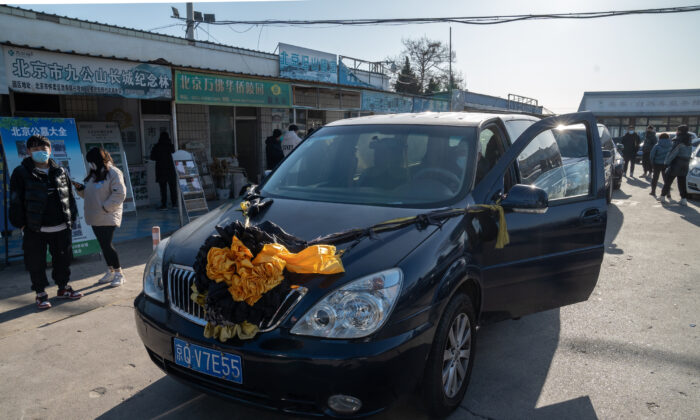 A vehicle decorated with traditional funeral adornments outside Dongjiao Funeral Parlor, reportedly designated to handle COVID fatalities, in Beijing on Dec. 19, 2022. (Bloomberg)