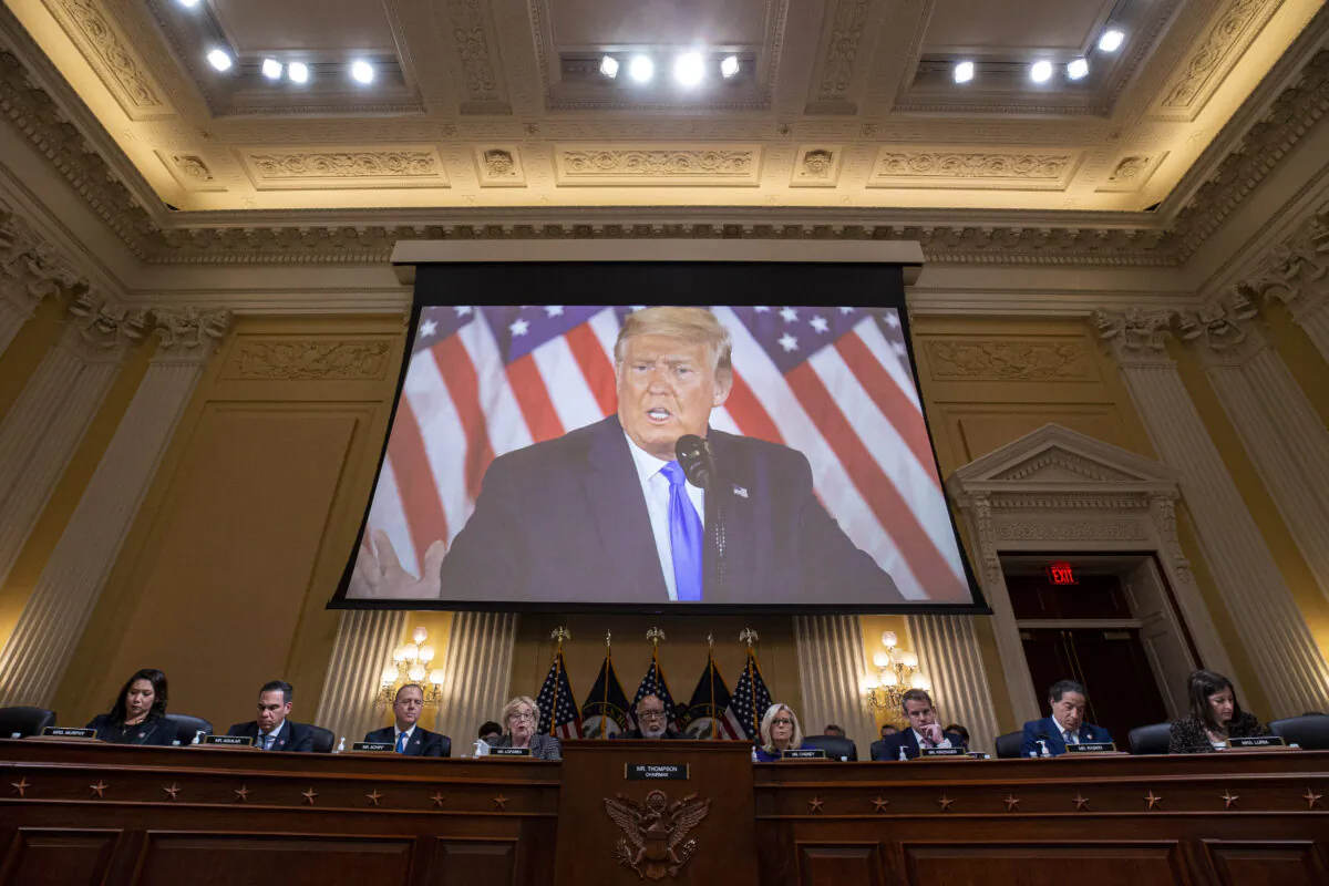 Former President Donald Trump is displayed on a screen during a meeting of the Jan. 6 House select committee in the Canon House Office Building on Capitol Hill in Washington on Dec. 19, 2022. (Al Drago/Getty Images)