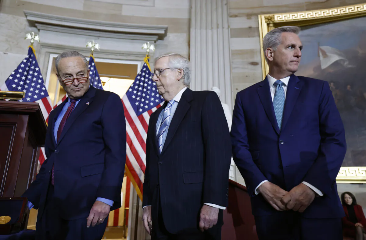 Senate Majority Leader Charles Schumer (D-N.Y.), Senate Minority Leader Mitch McConnell (R-Ky.), and House Minority Leader Kevin McCarthy (R-Calif.) attend a Congressional Gold Medal Ceremony for U.S. Capitol Police and D.C. Metropolitan Police officers in the Rotunda of the U.S. Capitol Building in Washington on Dec. 6, 2022. Bipartisan and bicameral leadership held the ceremony to award the Congressional Gold Medals to law enforcement officers who protected the U.S. Capitol Building on Jan. 6, 2021. (Anna Moneymaker/Getty Images)
