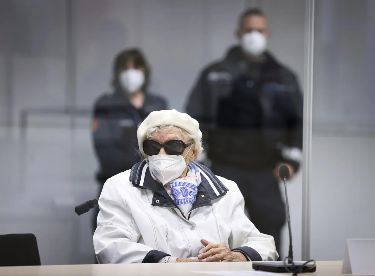 The at this time 96-year-old defendant Irmgard F. sits in the courtroom at the beginning of the trial day in Itzehoe, Germany, on Nov. 9, 2021. (Christian Charisius/Pool via AP)