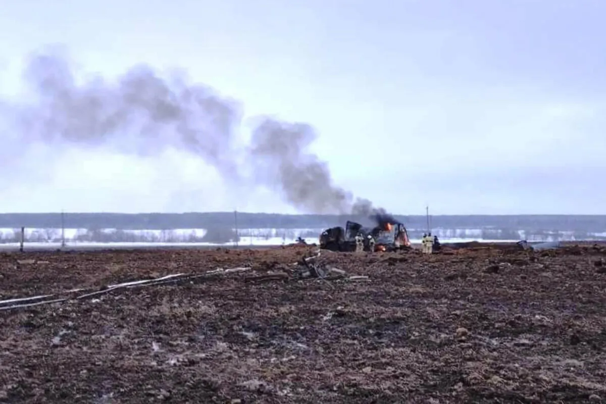 Firefighters work at the site of gas explosion, near the village of Yambakhtino, some 50km (31miles) south of Cheboksary, Chuvashia region, Russia, in a still from video released on Dec. 20, 2022. (Ministry of Emergency Situations press service via AP)