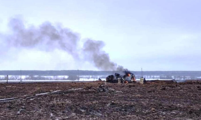 Firefighters work at the site of gas explosion, near the village of Yambakhtino, some 50km (31miles) south of Cheboksary, Chuvashia region, Russia, in a still from video released on Dec. 20, 2022. Ministry of Emergency Situations press service via AP)