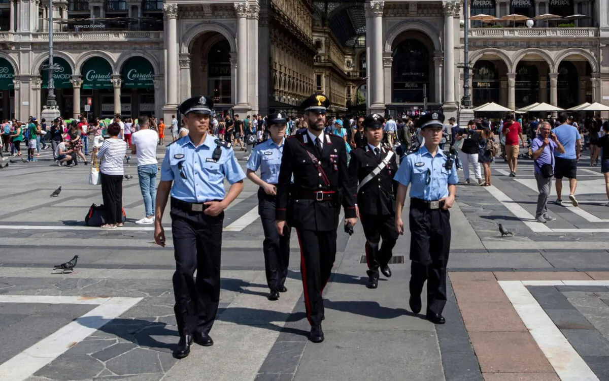 Italian Carabinieri and Chinese policemen patrol together in Milan in 2018. (Emanuele Cremaschi/Getty)
