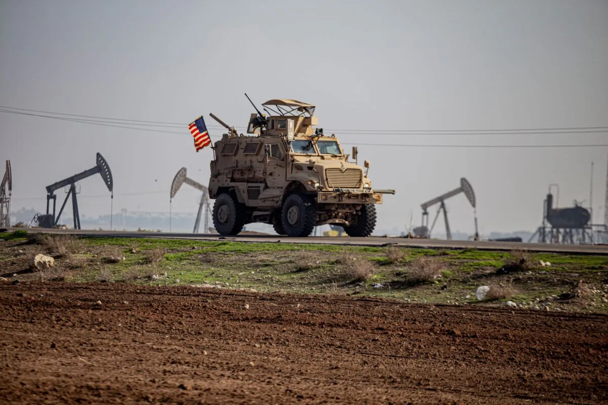 A US military vehicle on a patrol in the countryside near the town of Qamishli, Syria, on Dec. 4, 2022. (Baderkhan Ahmad/AP Photo)