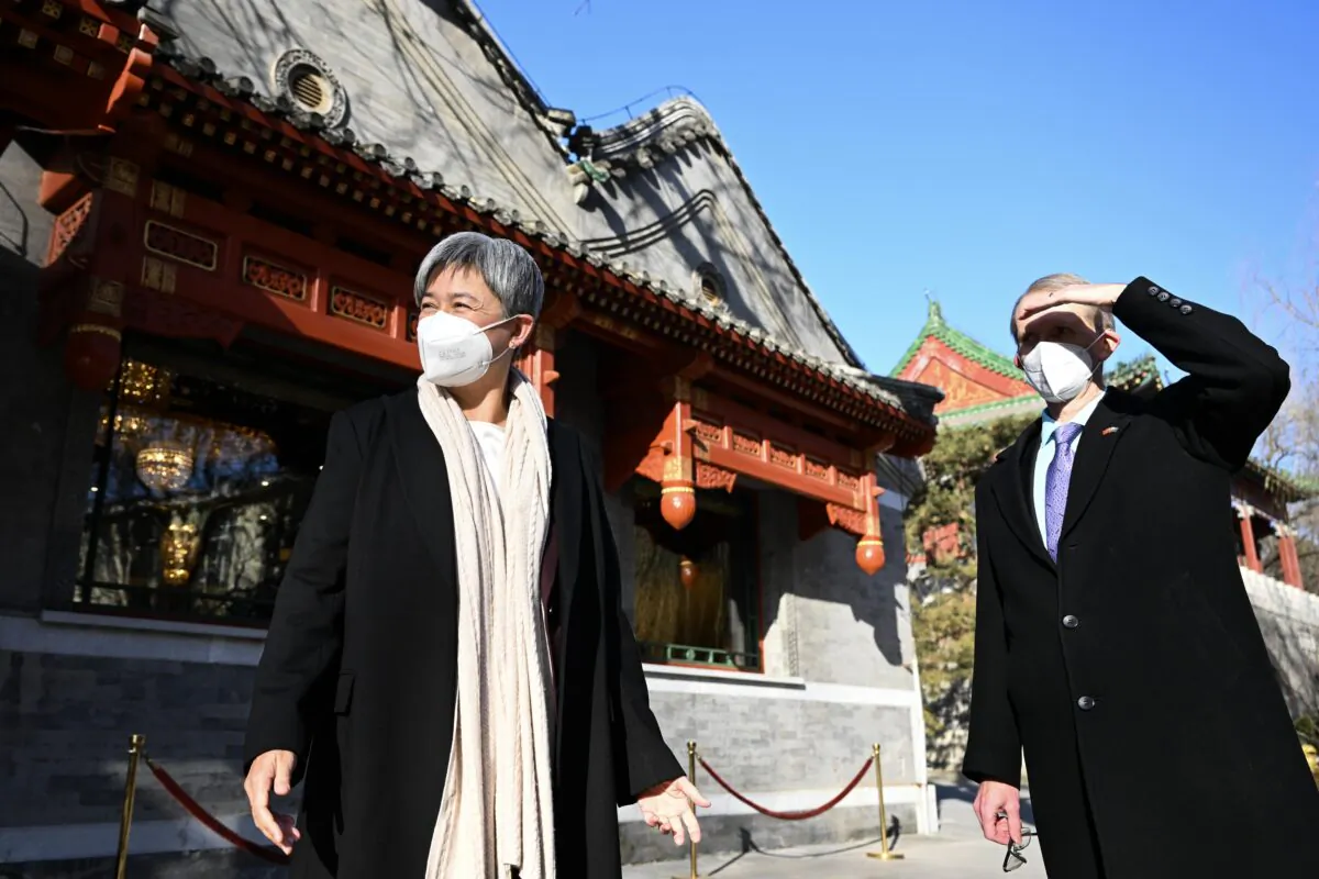 Australian Foreign Minister Penny Wong meets with Australian Ambassador to China Graham Fletcher at the Diaoyutai State Guesthouse in Beijing, China, on Dec. 21, 2022.  (AAP Image/Lukas Coch) 