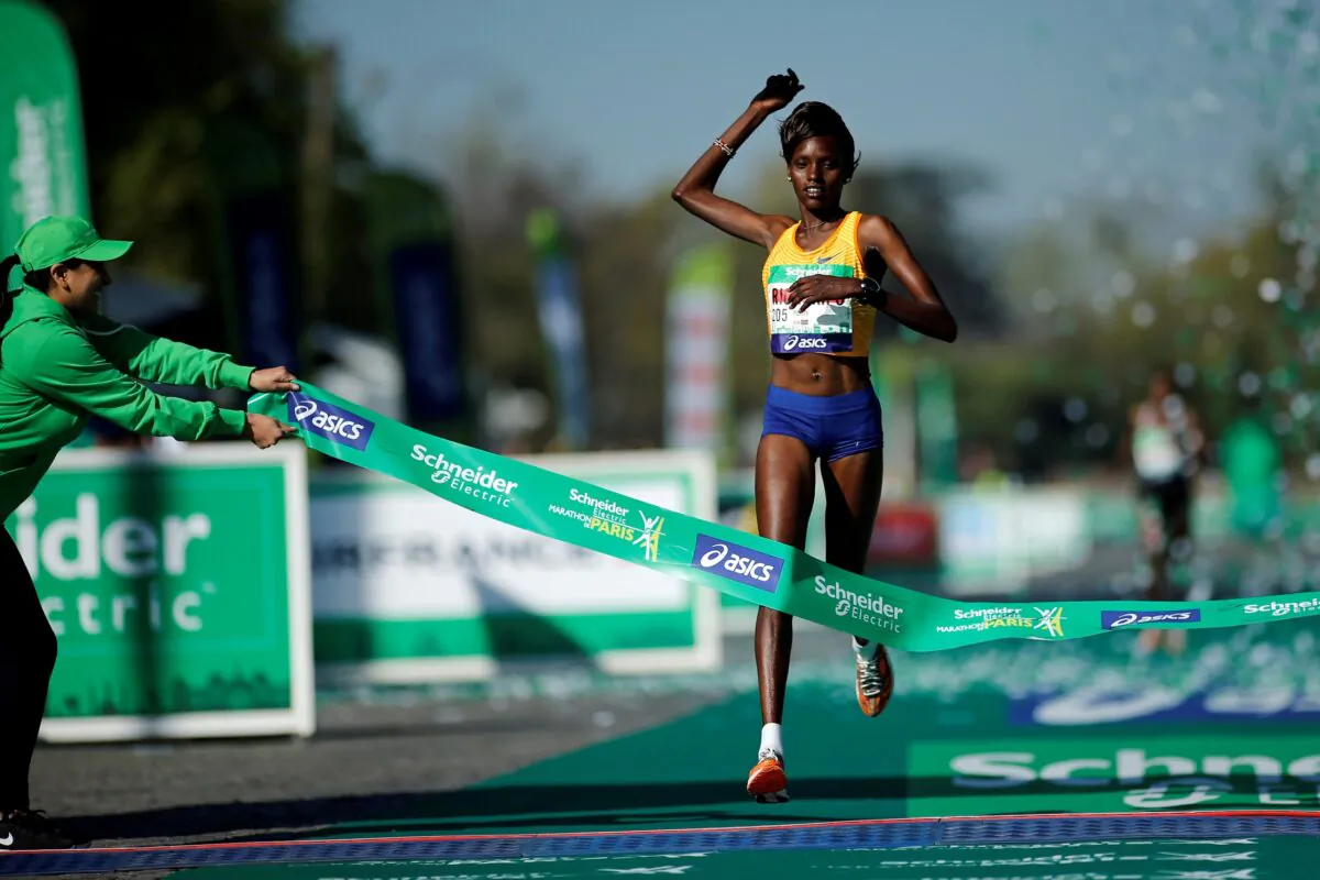Purity Rionoripo of Kenya crosses the finish line to win the womens race of the 41st Paris Marathon in Paris on April 9, 2017. (Benoit Tessier/Reuters)