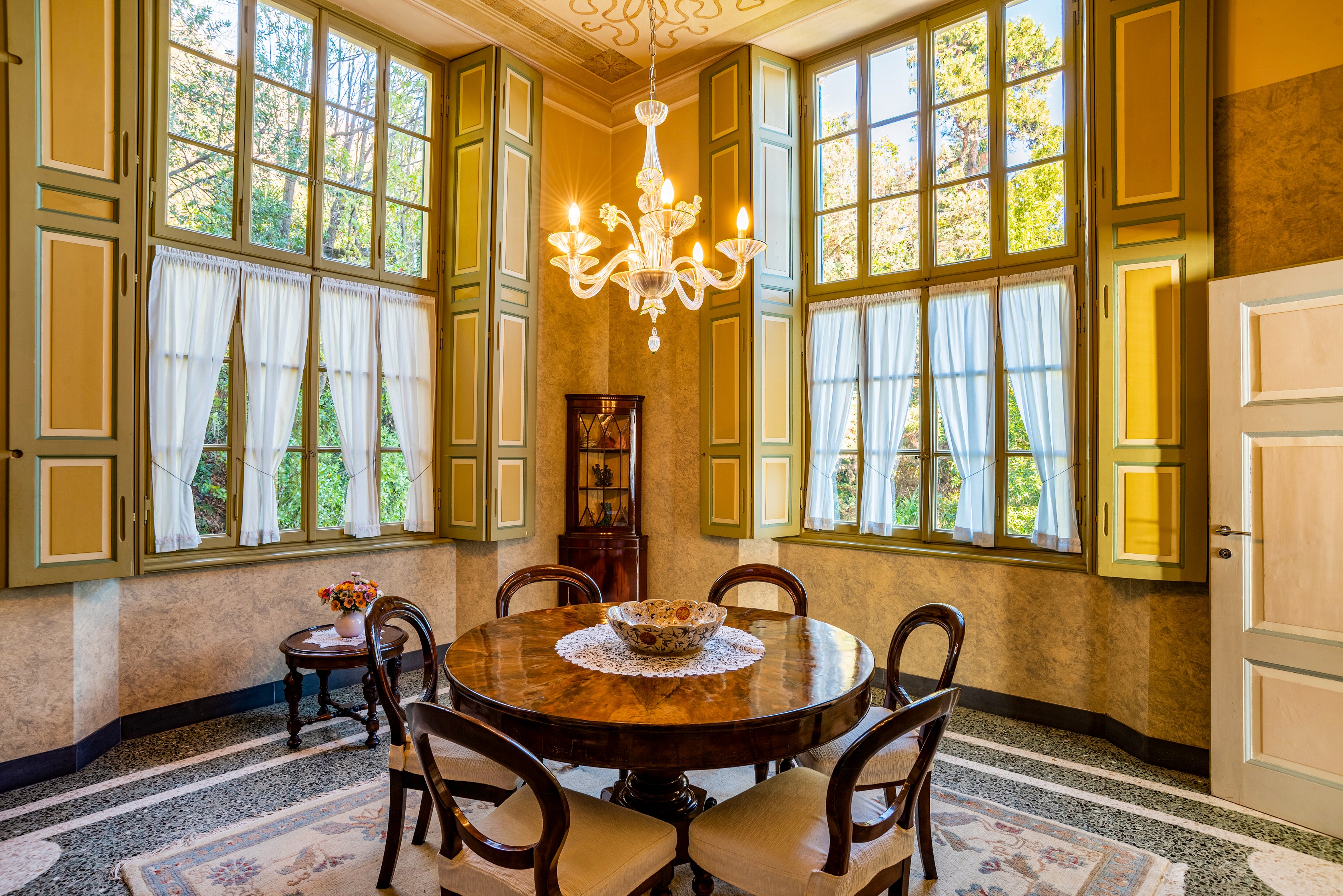 Image 4 Even the quaint dining room retains its sensual Art Nouveau details and soothing natural tones. (Courtesy of Sotheby_s International Realty)