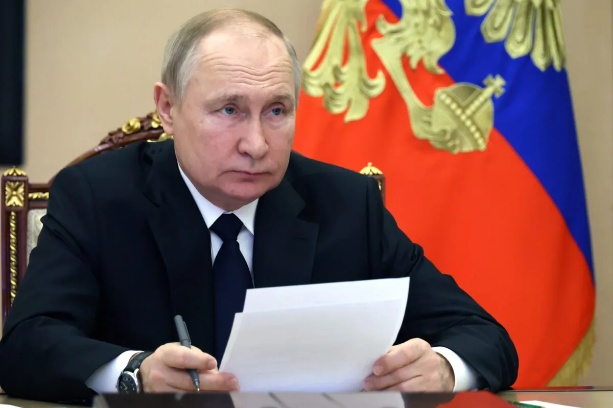 Russian President Vladimir Putin takes part in the launch ceremony of The Kovykta gas condensate field via videoconference in Moscow on Dec. 21, 2022. (Mikhail Kuravlev/Pool Photo via AP)