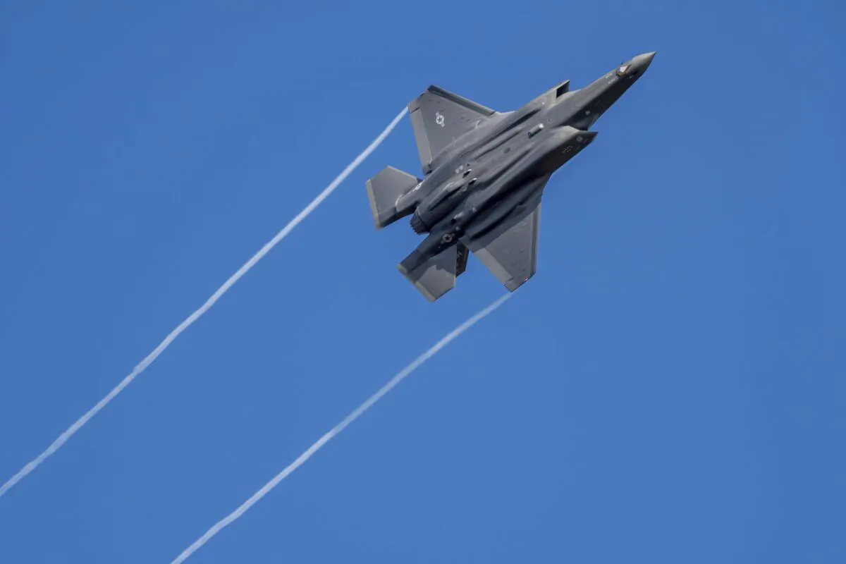 A U.S. F-35 fighter jet flies over the Eifel Mountains near Spangdahlem, Germany, Feb. 23, 2022. (The Canadian Press/AP-dpa, Harald Tittel)