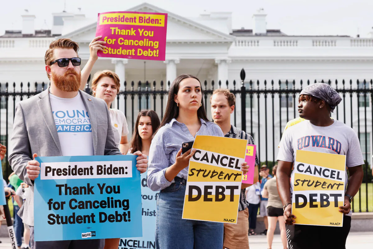 Student loan debtors hold a rally in front of the White House to celebrate President Joe Biden's intent to cancel student debt, which was later blocked by the Supreme Court on Aug. 24, 2022. (Paul Morigi/Getty Images for We the 45m)