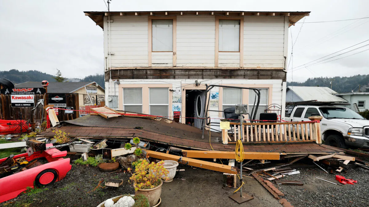 The collapsed second story porch of a house is seen after a strong 6.4-magnitude earthquake struck off the coast of northern California, in Rio Dell, Calif., on Dec. 20, 2022. (Fred Greaves/Reuters)