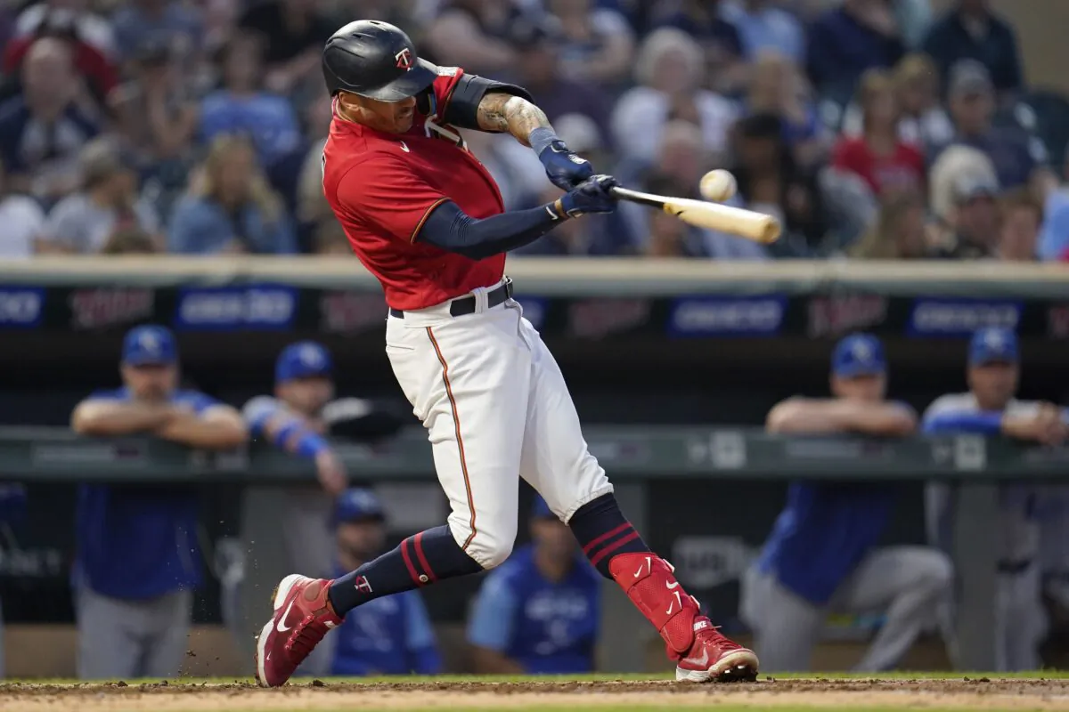 Minnesota Twins' Carlos Correa hits an RBI double during the third inning of a baseball game against the Kansas City Royals in Minneapolis on Sept. 13, 2022. (Abbie Parr/AP Photo)