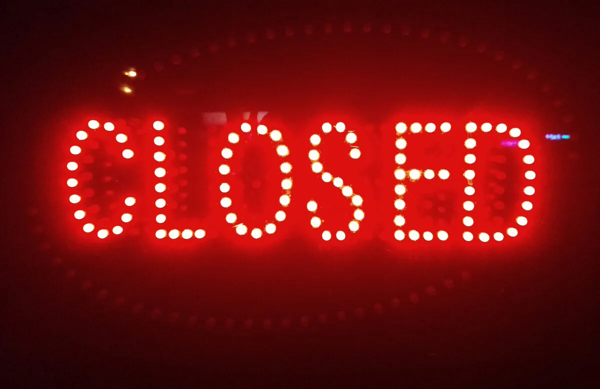 A "closed" sign is seen in the window of a business in Los Angeles, on Aug. 6, 2020. (Frederic J. Brown/AFP via Getty Images)