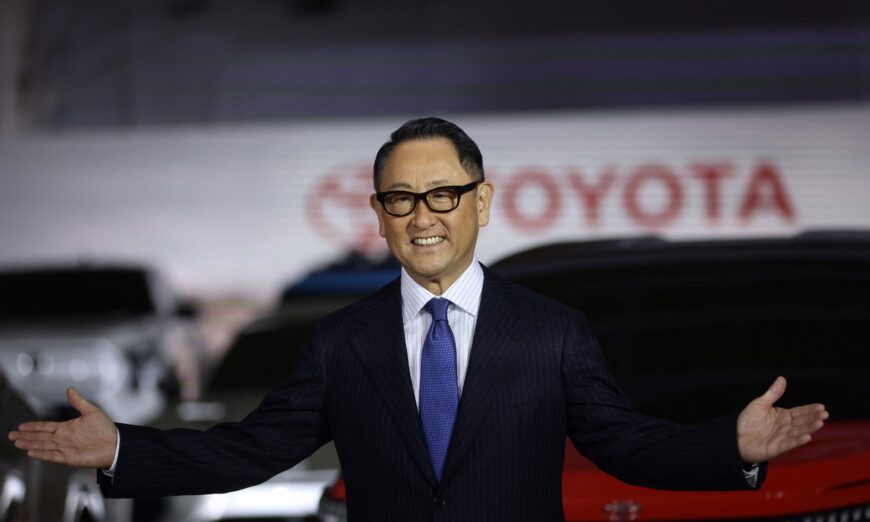 Toyota Chairman acknowledges growing acceptance of electric vehicles.