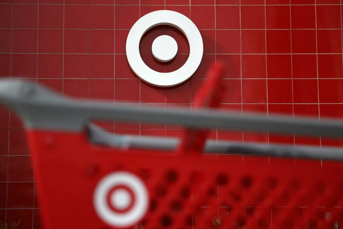 A Target shopping cart in front of a store logo in Azusa, Calif., on Nov. 16, 2017. (Lucy Nicholson/Reuters)
