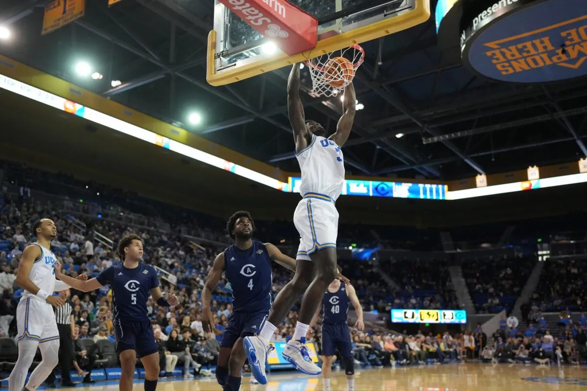 UCLA Bruins forward Adem Bona (3) dunks the ball against the UC Davis Aggies in the second half at Pauley Pavilion in Los Angeles on Dec. 21, 2022. (Kirby Lee/USA TODAY Sports via Field Level Sports)