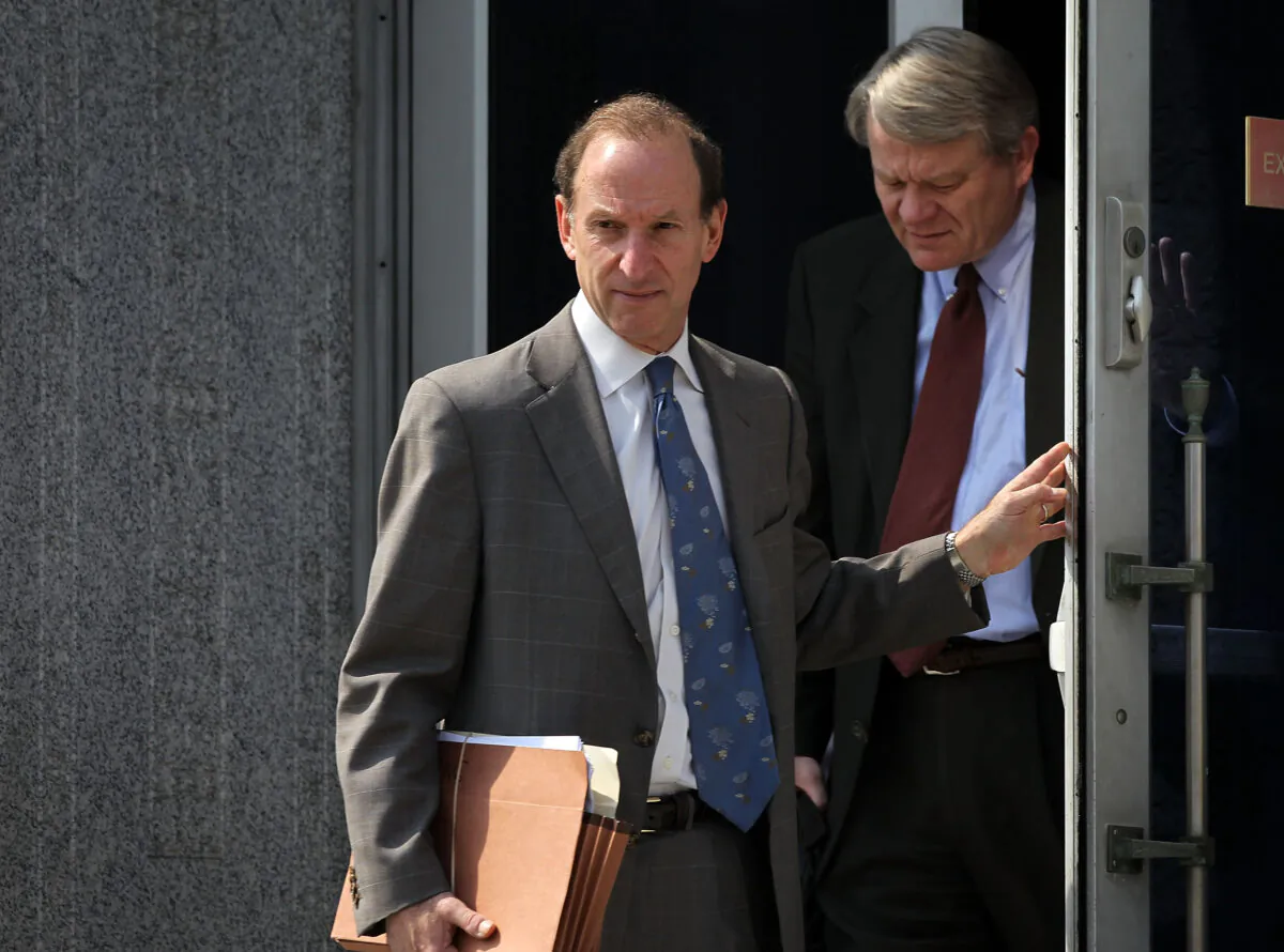 Abbe Lowell (L) leaves a federal courthouse in Greensboro, North Carolina on May 25, 2012. (Alex Wong/Getty Images)