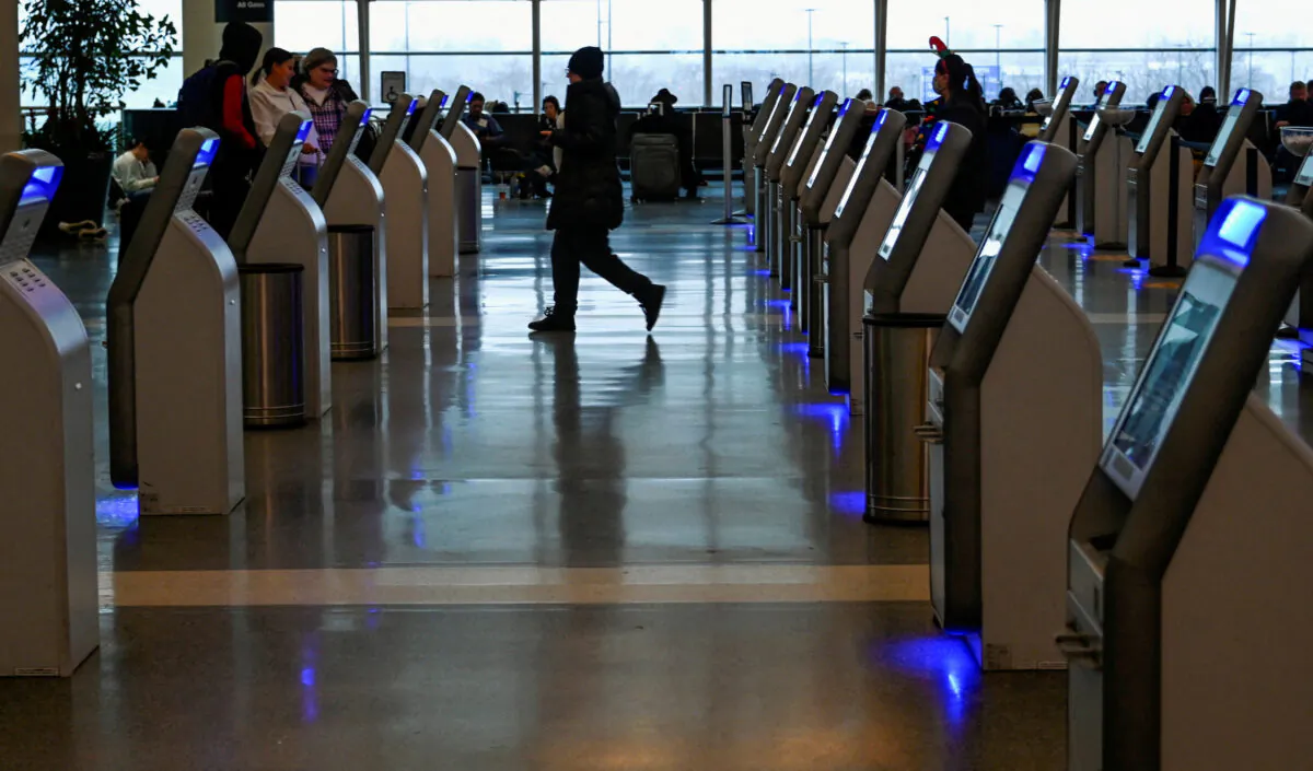 Passengers arrive for their flight on Southwest Airlines as flight cancellations mount during a cold weather front as a weather phenomenon known as a bomb cyclone hits the Upper Midwest, at Midway International Airport in Chicago on Dec. 22, 2022. (Matt Marton/Reuters)