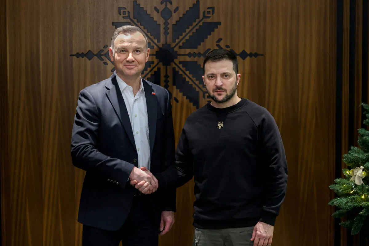 Ukrainian President Volodymyr Zelenskyy (R) and Polish President Andrzej Duda meet after Zelenskyy's visit to Washington, at Rzeszow-Jasionka Airport, Poland, on Dec. 22, 2022. (Jakub Szymczuk/KPRP/Handout via Reuters)