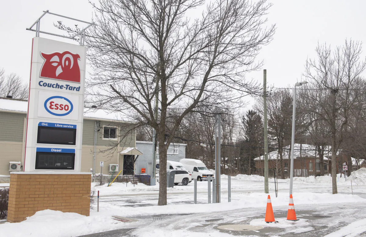 A gas station is shown without power, following a winter storm in the region, in Montreal on Dec. 24, 2022. (Graham Hughes/The Canadian Press)