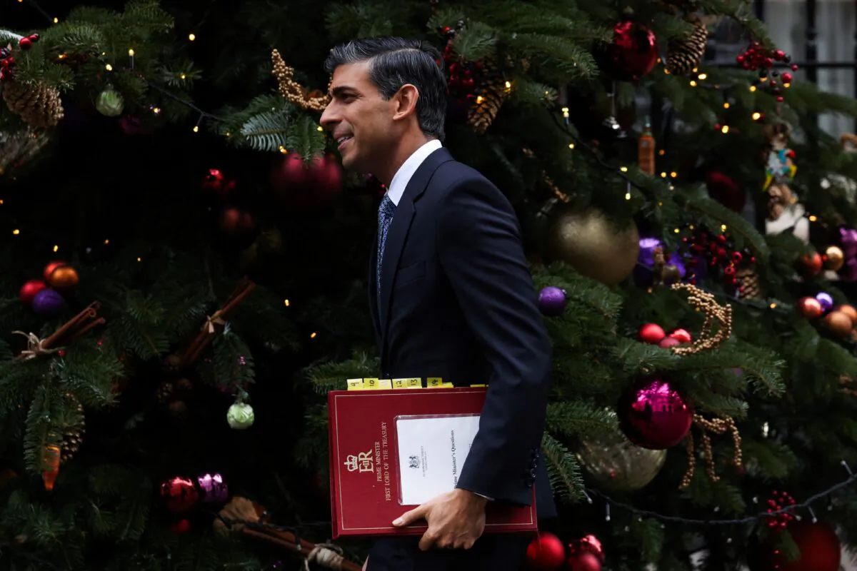 Britain's Prime Minister Rishi Sunak leaves 10 Downing Street to attend the Prime Minister's Questions (PMQ) session at the House of Commons, in London, on Dec. 14, 2022. (Isabel Infantes /AFP via Getty Images)
