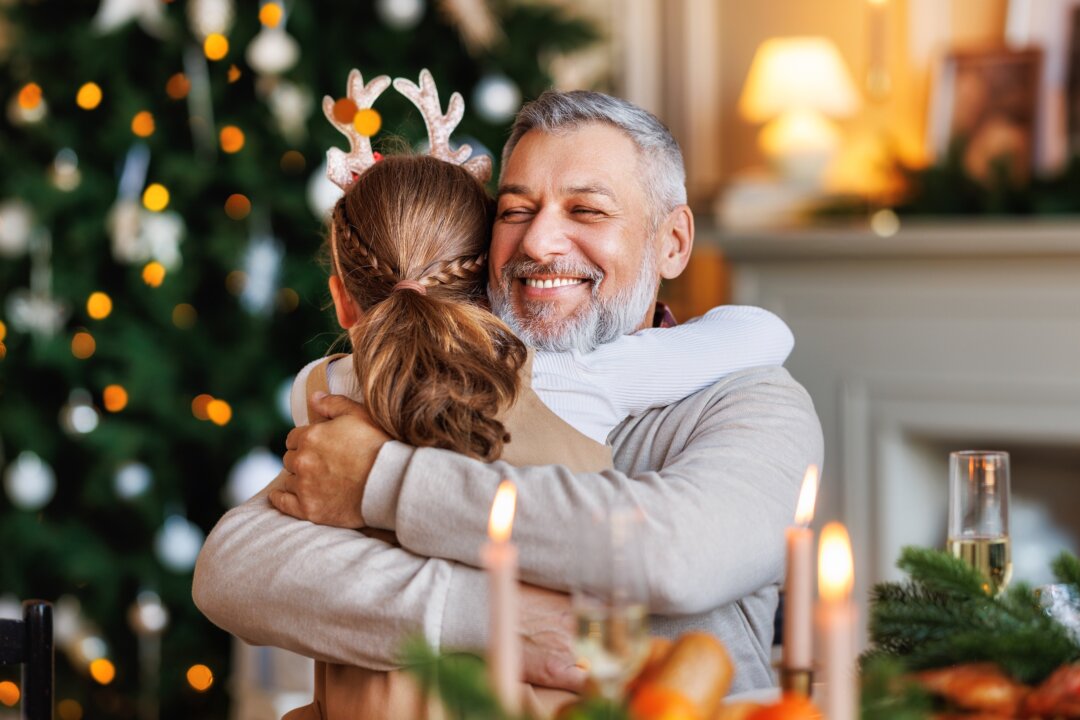 Taking the time to recognize the accomplishments of others at a holiday gathering will "maximize the benefits to your well-being and the well-being of all the attendees at that holiday party," says Kelley Gullo Wight.(Evgeny Atamanenko/Shutterstock)