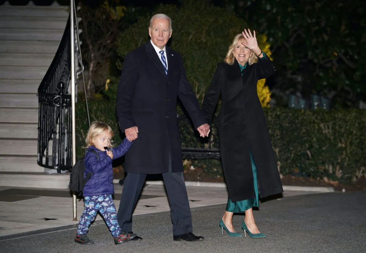 President Joe Biden and First Lady Jill Biden with grandson Beau Biden Jr., make their way to board Marine One from the South Lawn of the White House on Dec. 16, 2022. (Mandel Ngan/AFP via Getty Images)