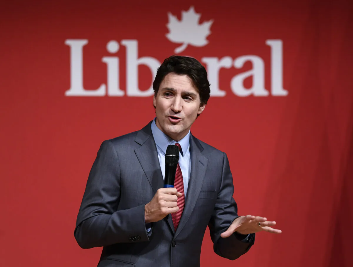 Prime Minister Justin Trudeau delivers an address at the Laurier Club Holiday Event, an appreciation event for supporters of the Liberal Party of Canada, in Gatineau, Que., on Dec. 15, 2022. (The Canadian Press/Justin Tang)