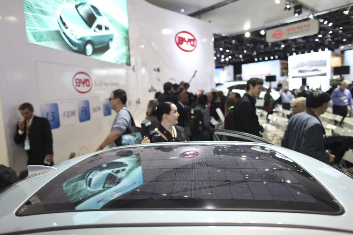 A solar panel is integrated into Chinese automaker BYD's F3BD, a hybrid vehicle at the company's display at the North American International Auto Show in Detroit, Michigan, on Jan. 10, 2011. (Geoff Robins/AFP via Getty Images)
