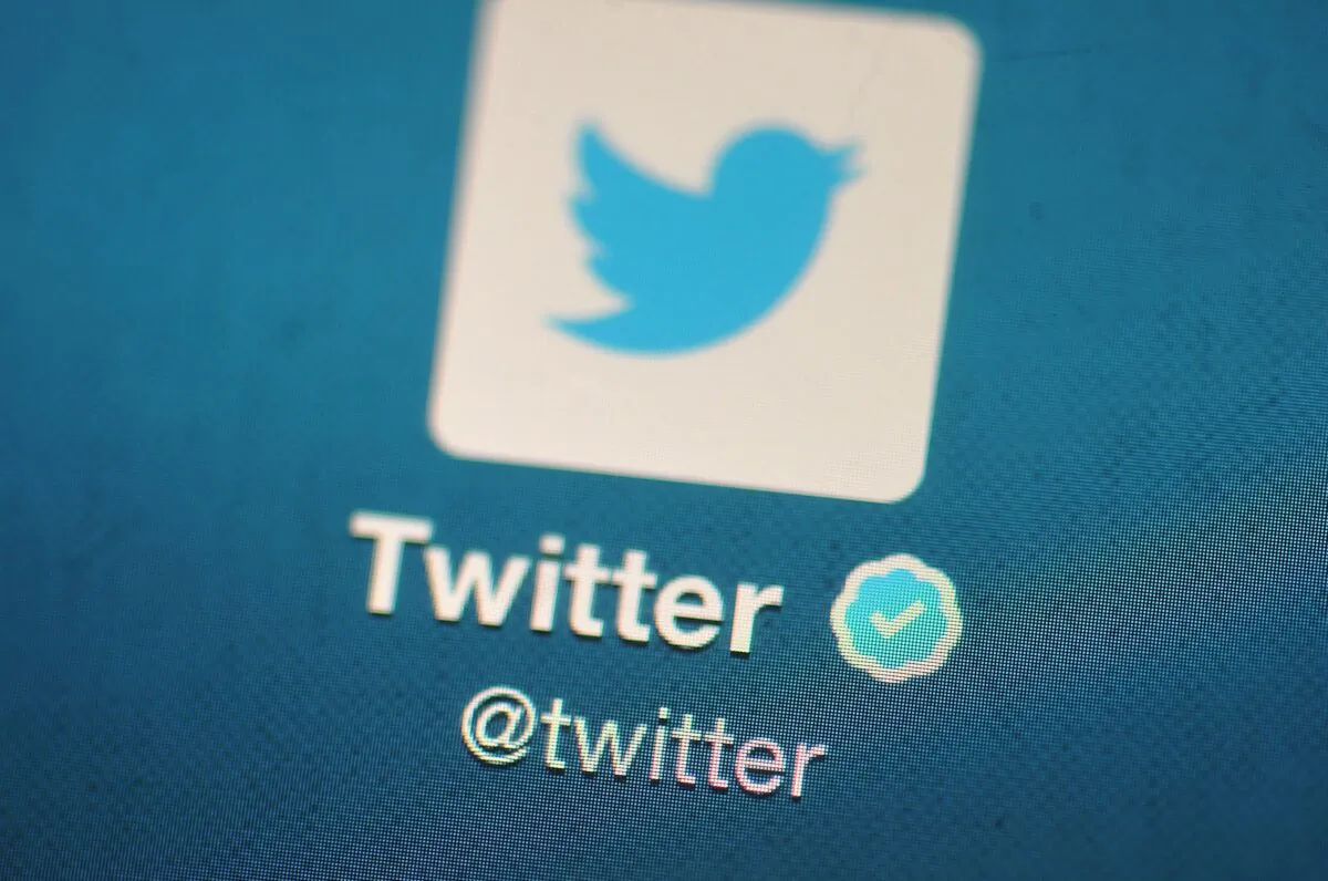The Twitter logo is displayed on a mobile device in London on Nov. 7, 2013. (Bethany Clarke/Getty Images)