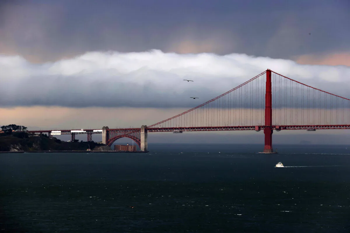 A weather system moves by the Golden Gate Bridge as seen from Alcatraz Island in San Francisco, on Aug. 17, 2020. (Justin Sullivan/Getty Images)