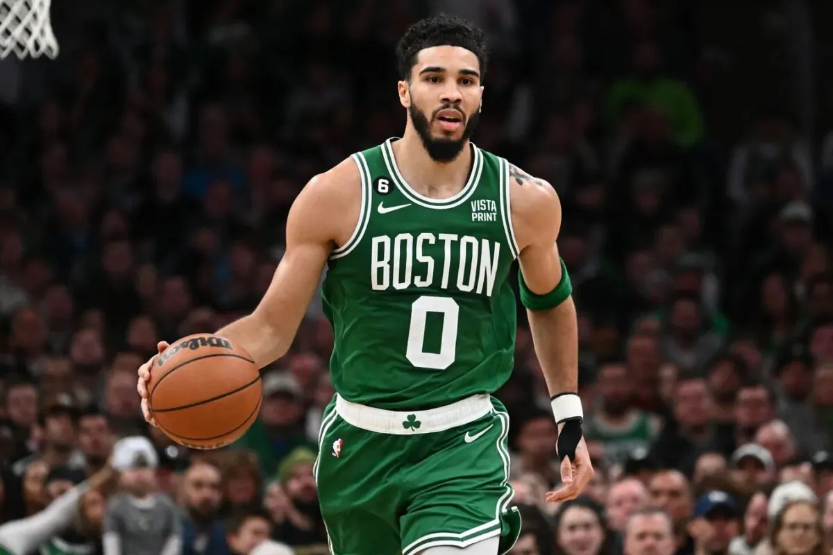 Boston Celtics forward Jayson Tatum (0) dribbles the ball against the Indiana Pacers during the third quarter at the TD Garden in Boston on Dec. 21, 2022. (Brian Fluharty/USA TODAY Sports via Field Level Media)