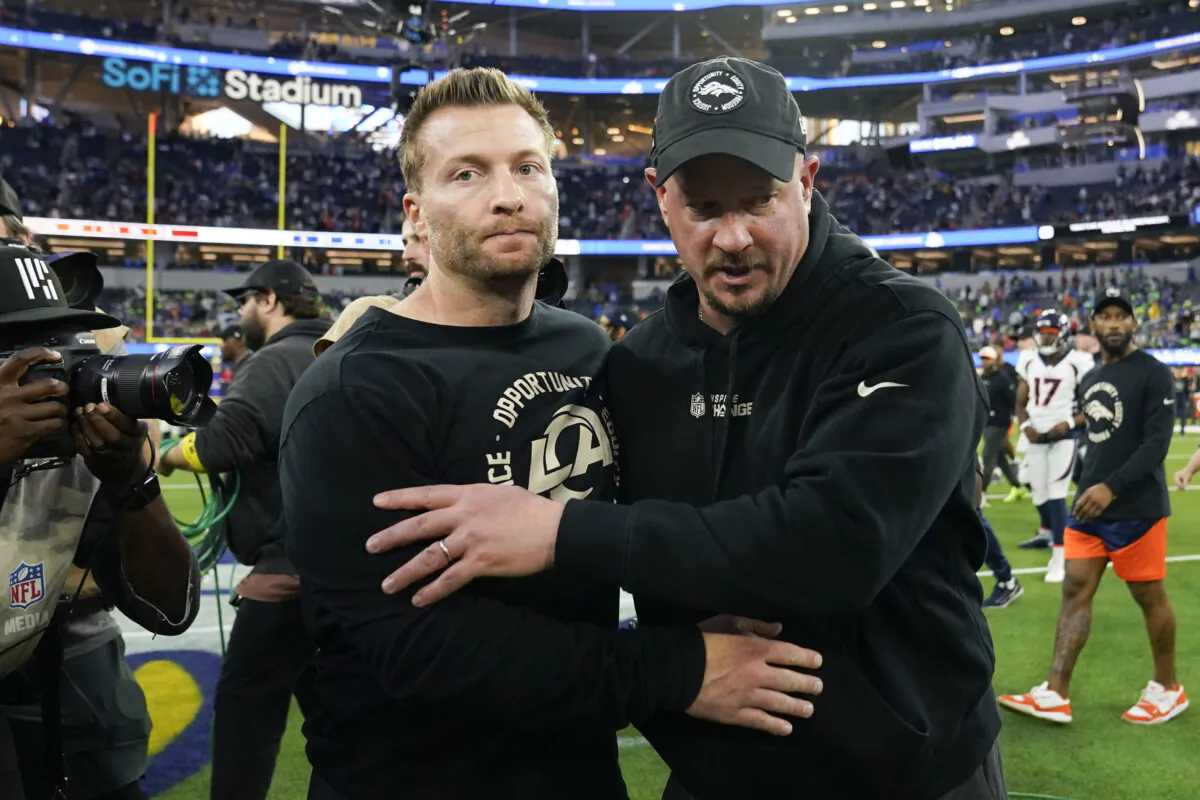 Los Angeles Rams head coach Sean McVay and Denver Broncos head coach Nathaniel Hackett (R) leaves the field after an NFL football game between the Los Angeles Rams and the Denver Broncos in Inglewood, Calif., on  Dec. 25, 2022. (Marcio J. Sanchez/AP Photo)