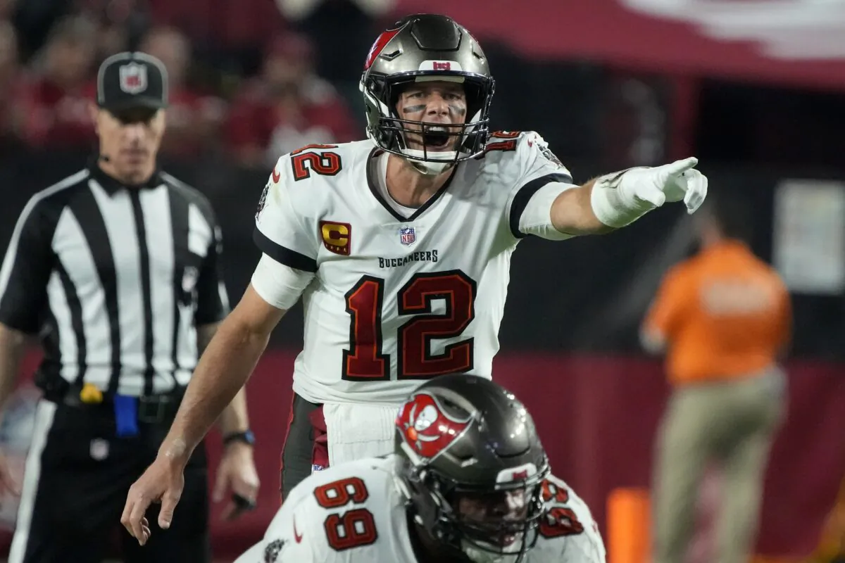 Tampa Bay Buccaneers quarterback Tom Brady (12) calls a play against the Arizona Cardinals during the second half of an NFL football game in Glendale, Ariz., on Dec. 25, 2022. (Rick Scuteri/AP Photo)