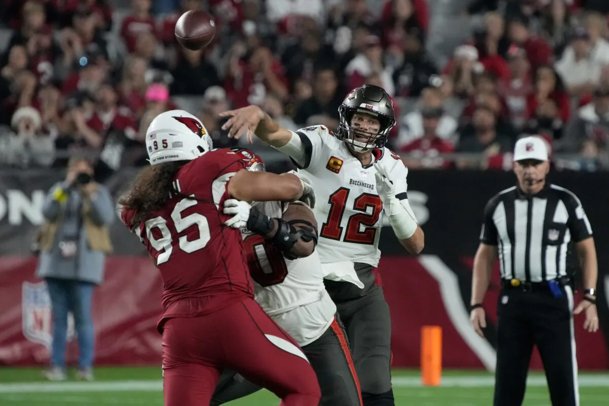 Tampa Bay Buccaneers quarterback Tom Brady (12) throws against the Arizona Cardinals during the second half of an NFL football game in Glendale, Ariz., on Dec. 25, 2022. (Rick Scuteri/AP Photo)