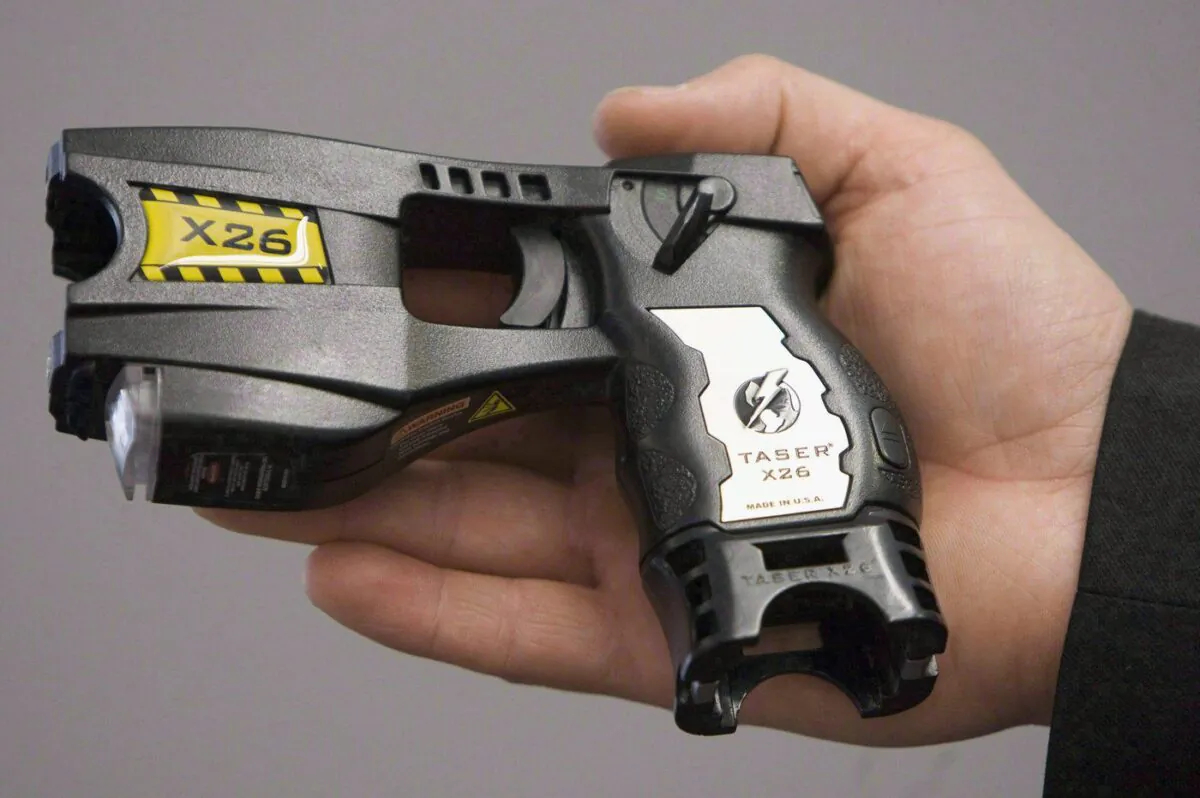 A police-issued Taser gun is displayed at the Victoria police station in Victoria in a file photo. (The Canadian Press/Jonathan Hayward)
